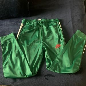 Silk green Nike pants